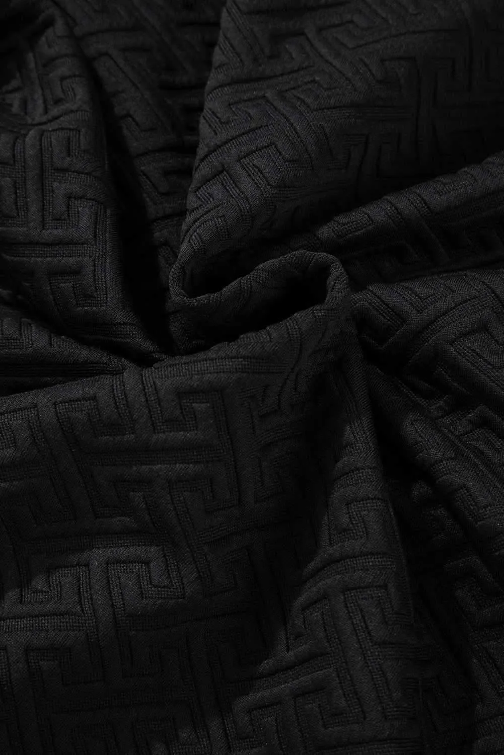 Textured black half-zip sweatshirt