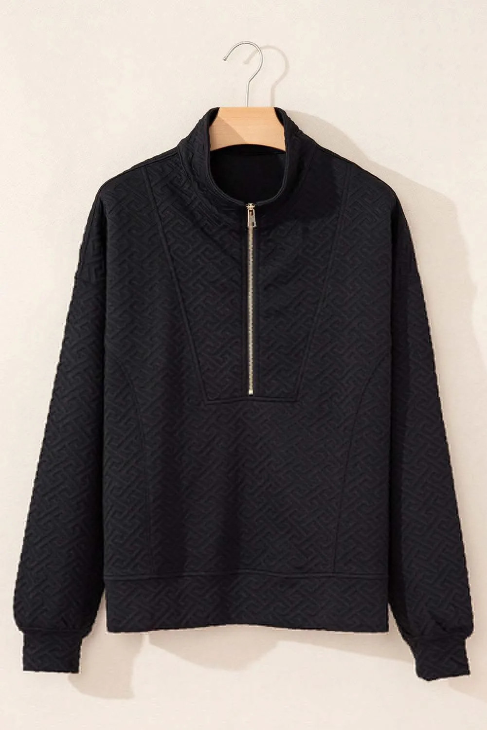 Textured black half-zip sweatshirt